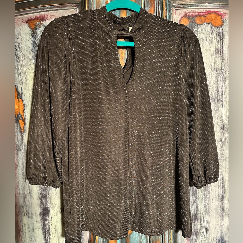 Shimmering black blouse for party, dressy, or casual
